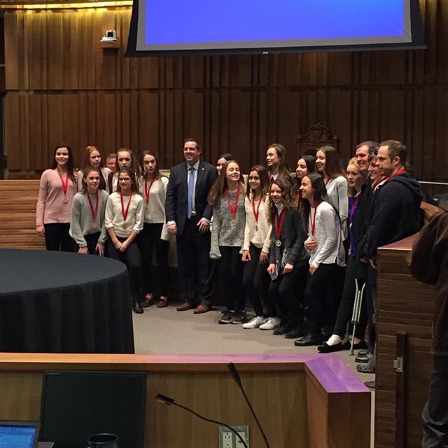 @mayorcamguthrie hands out medals to the Guelph Gryphons Girls U14 Red Rep team for winning the Ontario Soccer Association’s Indoor Cup to kick off #Guelph city council tonight.